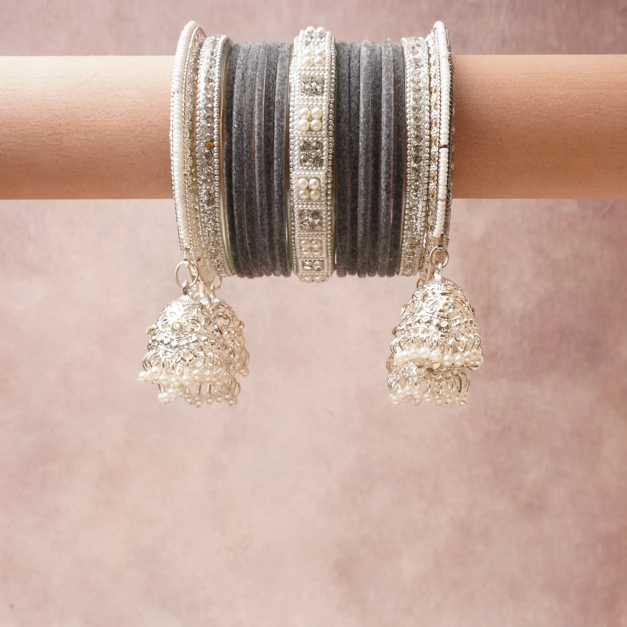 A commanding Anthracite Gray anchors this beautiful set, enriched with accents of Silver, Pearl White that add depth and dimension.

Featuring a striking composition of Velvet, Silver-toned Metal, Faux Pearls, Rhinestones, this set carries intricate craftsmanship and strong presence. Grand in form, it is created for moments that deserve to be marked.